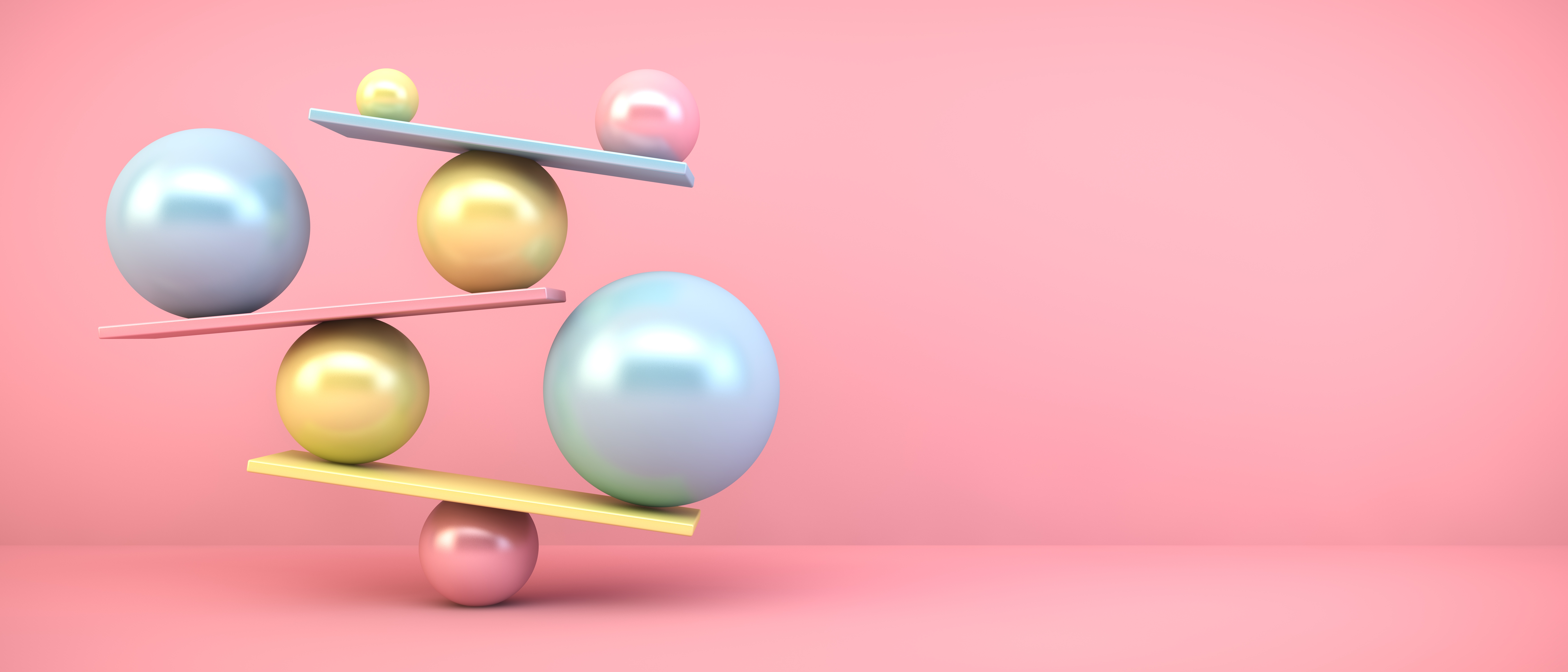 Beeld van ballen met daartussen planken waarop de ballen balanceren