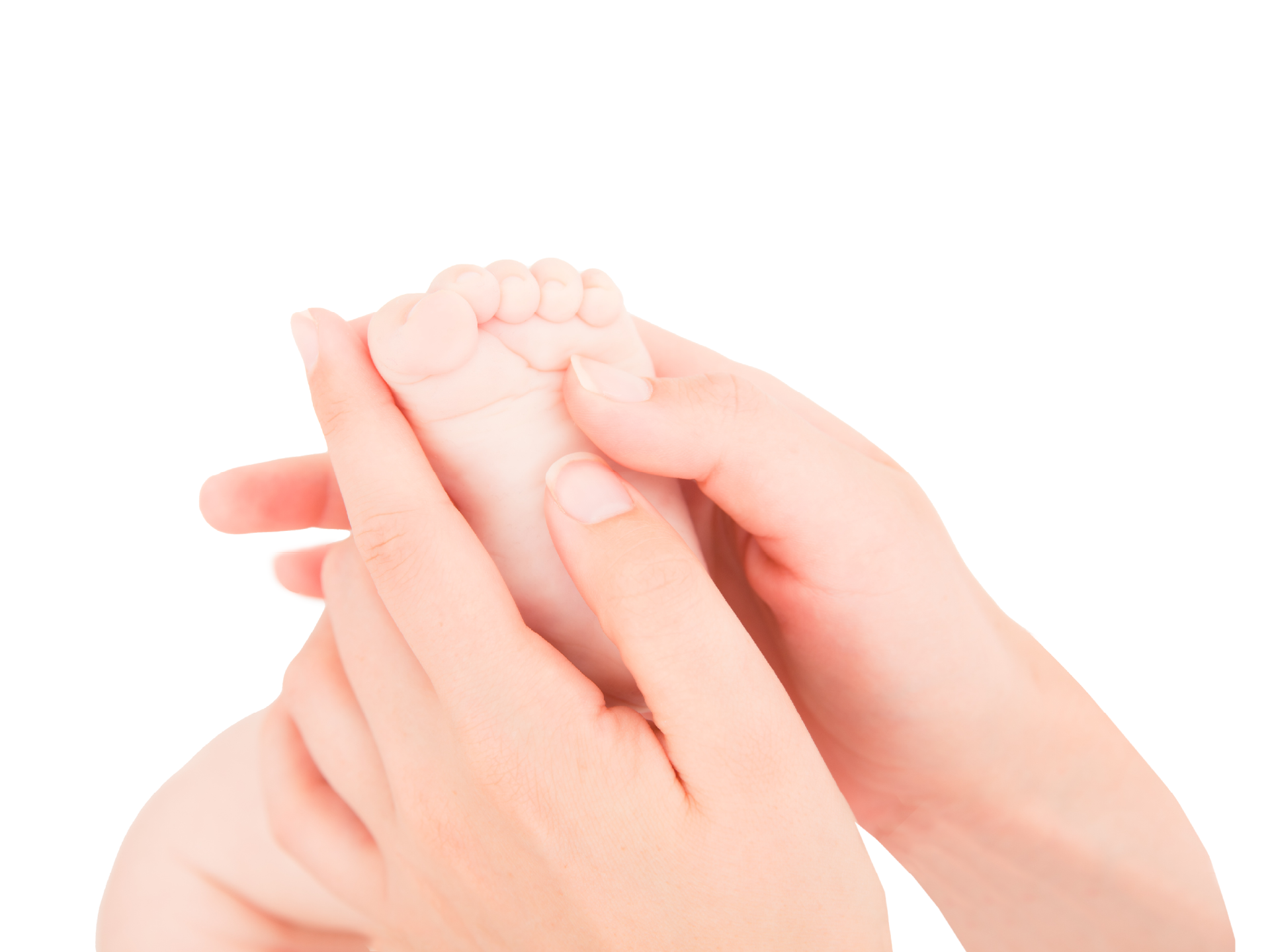 Handen die een babyvoet masseren